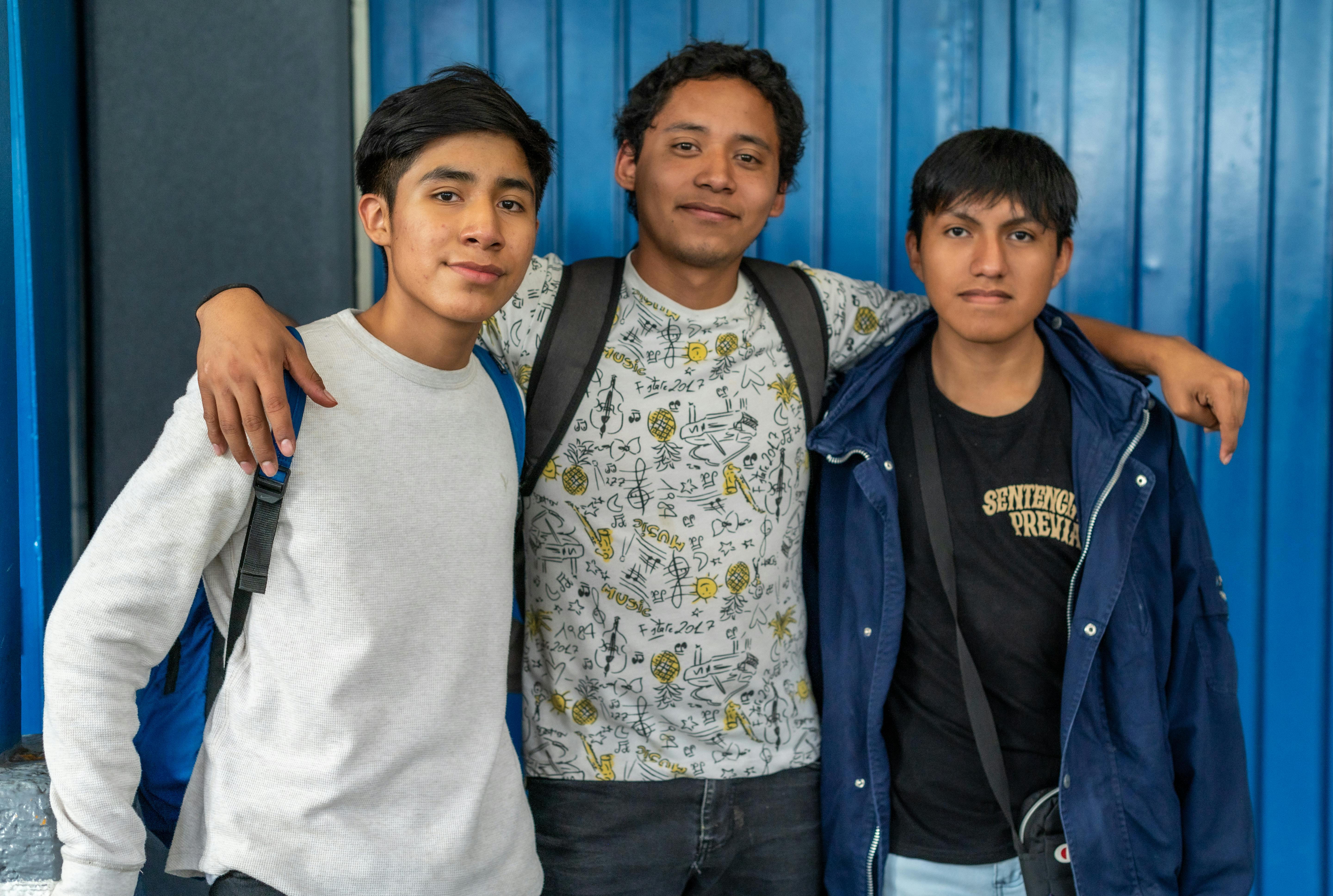 Students standing together at school